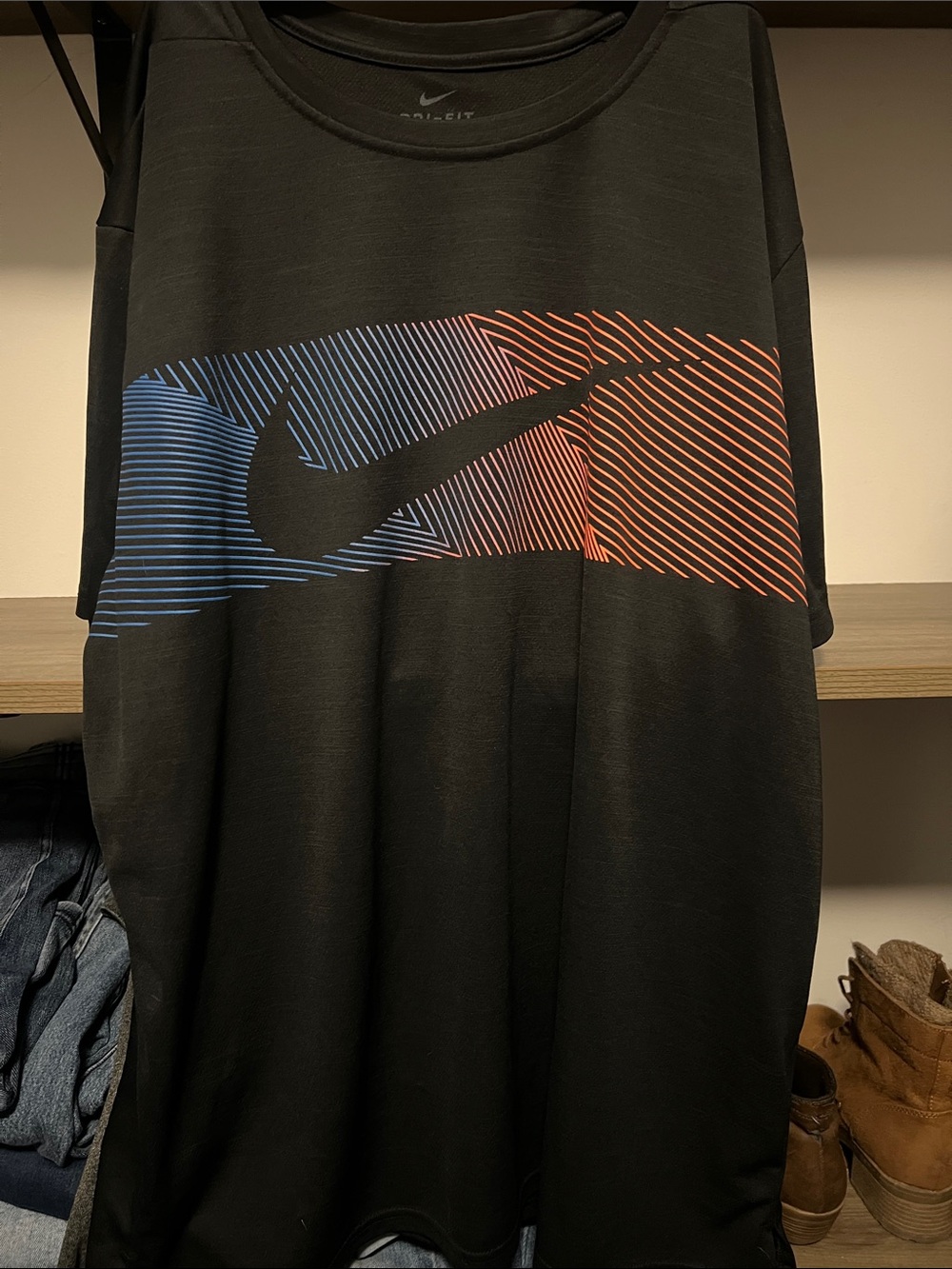 Nike Black Short-Sleeve Dri-FIT Tee with Blue and Orange Swoosh Graphic